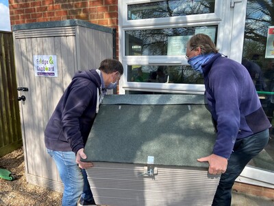 April and the Men in Sheds are erecting the outdoor Cupboard