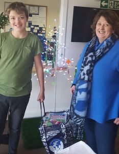 Nathan donates books for the Christmas appeal - Dec 22